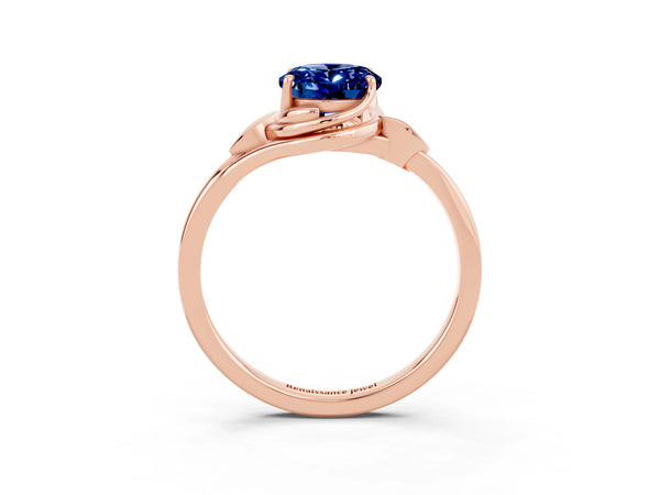 Rose gold Oval Cut Blue Sapphire Solitaire Ring with Twist Band and Four-Prong Setting