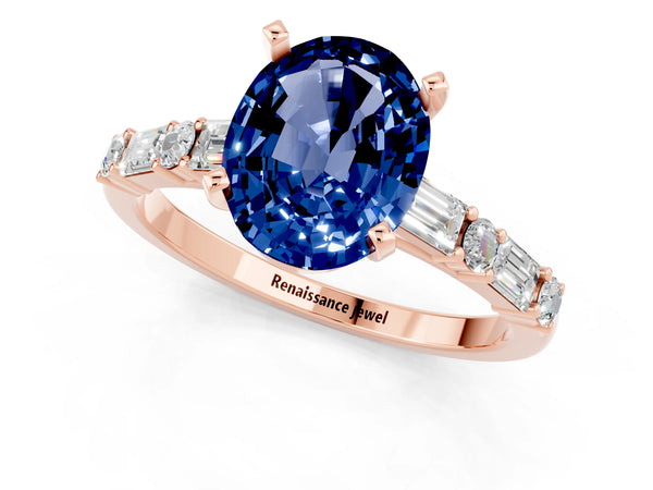 Rose gold Oval Cut Blue Sapphire Solitaire with Side Baguettes and Channel Set Band