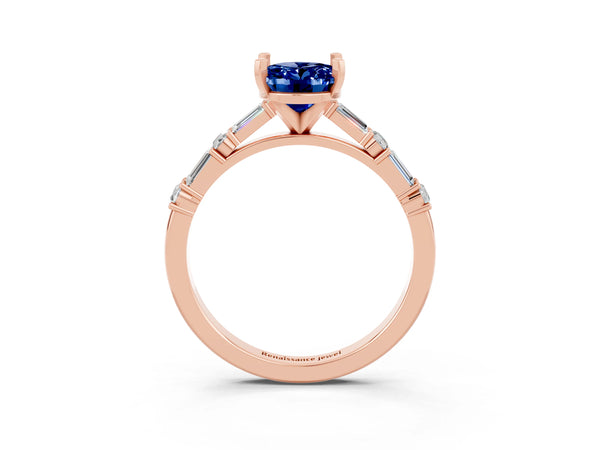 Rose gold Oval Cut Blue Sapphire Solitaire with Side Baguettes and Channel Set Band