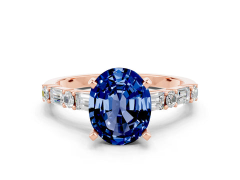 Rose gold Oval Cut Blue Sapphire Solitaire with Side Baguettes and Channel Set Band