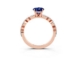 Rose gold Oval Cut Blue Sapphire Solitaire with Side Stones on a Pavé Band and Four-Prong Setting_3