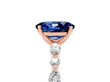 Rose gold Oval Cut Blue Sapphire Solitaire with Side Stones on a Pavé Band and Four-Prong Setting_5
