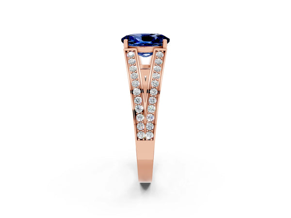 Rose gold Oval Cut Blue Sapphire Split Shank Ring with Pavé Band and Four-Prong Setting