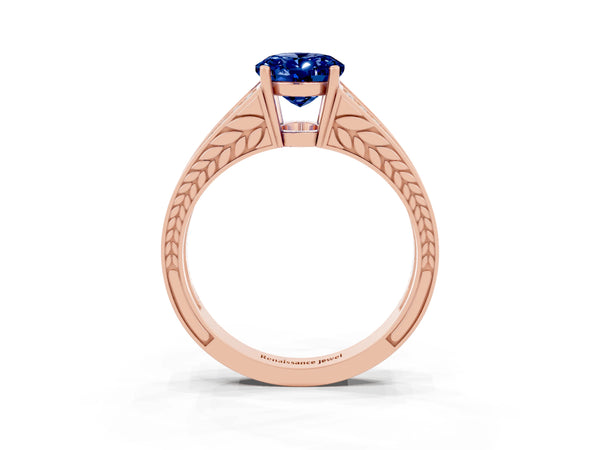 Rose gold Oval Cut Blue Sapphire Split Shank Ring with Pavé Band and Four-Prong Setting