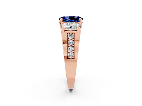 Rose gold Oval Cut Blue Sapphire Three-Stone Ring with Channel Set Band and Four-Prong Setting
