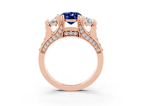 Rose gold Oval Cut Blue Sapphire Three-Stone Ring with Channel Set Band and Four-Prong Setting_3
