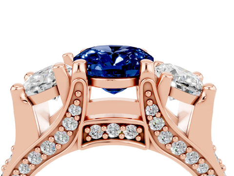 Rose gold Oval Cut Blue Sapphire Three-Stone Ring with Channel Set Band and Four-Prong Setting_4