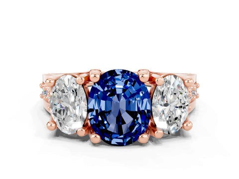 Rose gold Oval Cut Blue Sapphire Three-Stone Ring with Channel Set Band and Four-Prong Setting