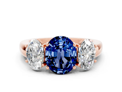 Rose gold Oval Cut Blue Sapphire Three-Stone Ring with Four-Prong Setting and Classic Band