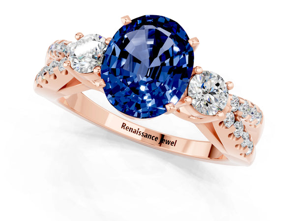 Rose gold Oval Cut Blue Sapphire Three-Stone Ring with Pavé Split Shank and Four-Prong Setting