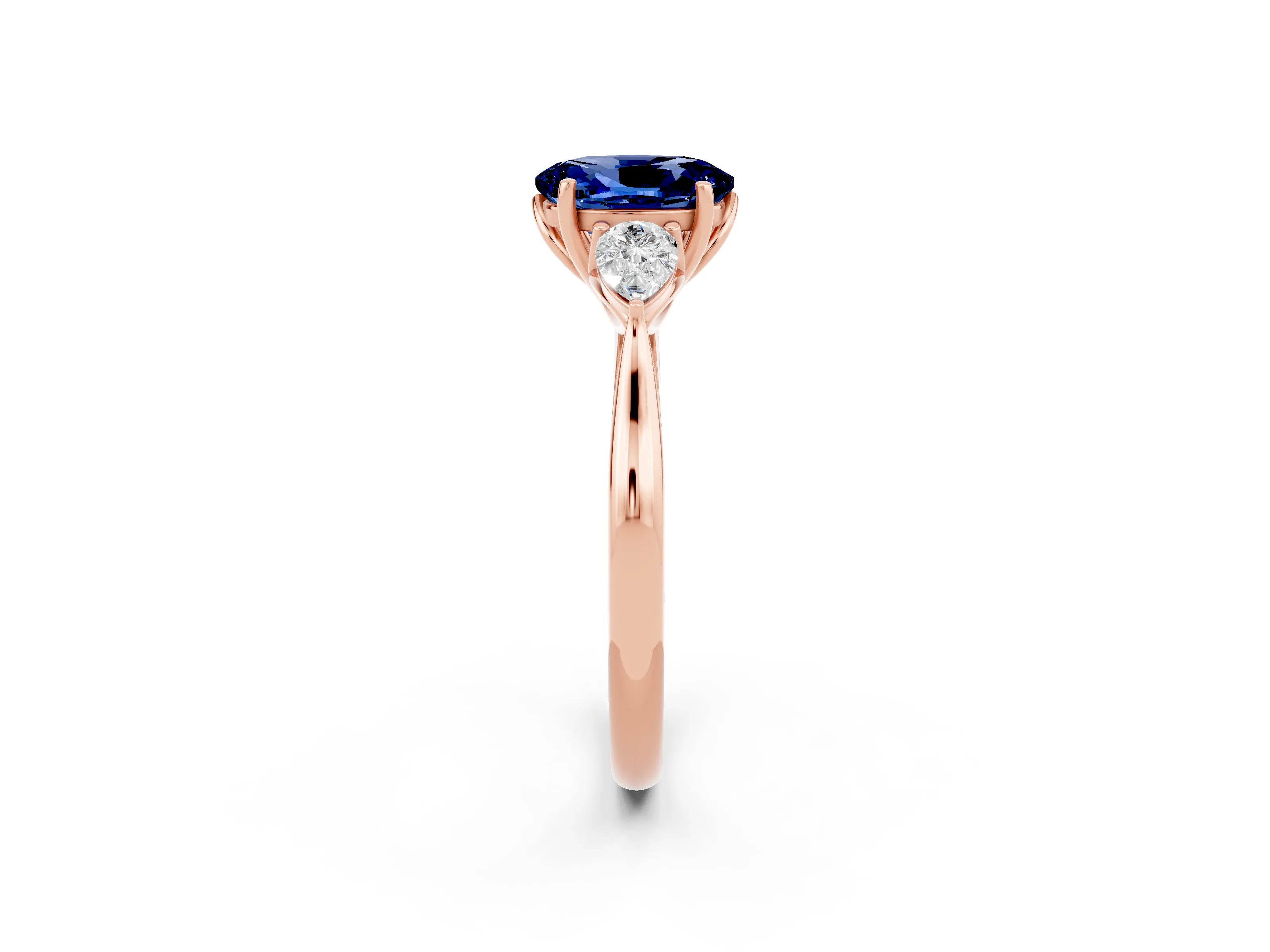 Rose gold Oval Cut Blue Sapphire Three-Stone Ring with Pear Side Stones and Four-Prong Setting_14