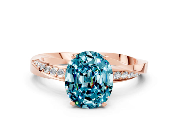 Rose gold Oval Cut Blue Topaz Engagement Ring with Side Stone Accents and Four-Prong Setting