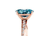 Rose gold Oval Cut Blue Topaz Engagement Ring with Side Stone Accents and Four-Prong Setting_32