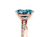 Rose gold Oval Cut Blue Topaz Engagement Ring with Side Stone Accents and Four-Prong Setting_65