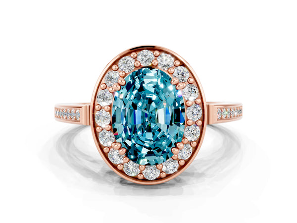 Rose gold Oval Cut Blue Topaz Halo Ring with Split Shank and Four-Prong Setting