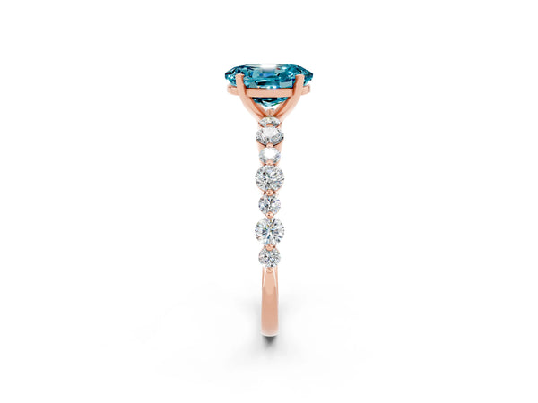 Rose gold Oval Cut Blue Topaz Prong Set Engagement Ring with Pavé Band