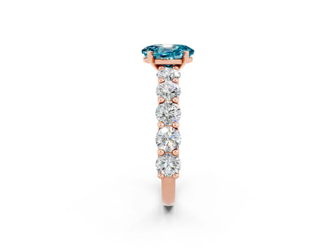 Rose gold Oval Cut Blue Topaz Prong Setting with Side Stones on a Pave Band_2