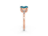 Rose gold Oval Cut Blue Topaz Ring with Side Stones and Four-Prong Setting_74