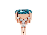 Rose gold Oval Cut Blue Topaz Ring with Side Stones and Four-Prong Setting_77