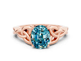 Rose gold Oval Cut Blue Topaz Solitaire Celtic Knot Ring with Four-Prong Setting_12