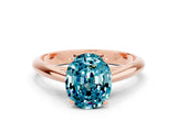 Rose gold Oval Cut Blue Topaz Solitaire Engagement Ring with Cathedral Setting and Four-Prong Mount_24
