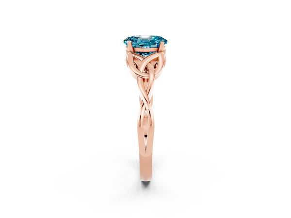 Rose gold Oval Cut Blue Topaz Solitaire Engagement Ring with Celtic Knot Band and Four-Prong Setting