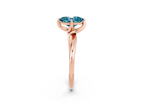Rose gold Oval Cut Blue Topaz Solitaire Engagement Ring with Four-Prong Setting and Classic Band