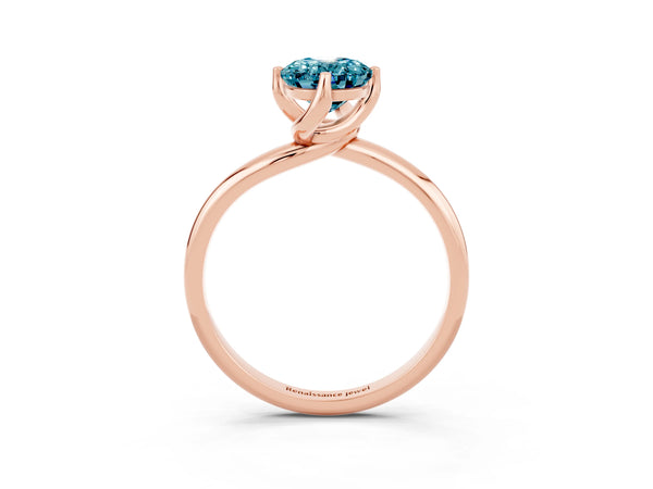 Rose gold Oval Cut Blue Topaz Solitaire Engagement Ring with Four-Prong Setting and Classic Band