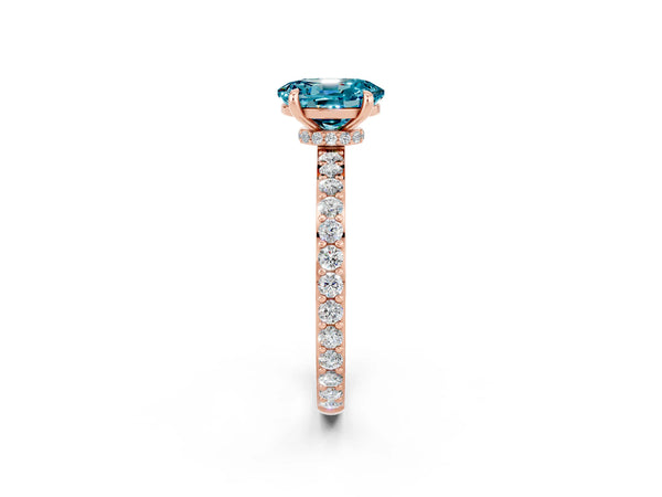 Rose gold Oval Cut Blue Topaz Solitaire Engagement Ring with Pavé Band and Four-Prong Setting