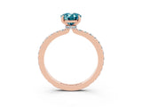 Rose gold Oval Cut Blue Topaz Solitaire Engagement Ring with Pavé Band and Four-Prong Setting_15
