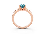 Rose gold Oval Cut Blue Topaz Solitaire Engagement Ring with Round Band and Four-Prong Setting_3