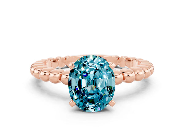 Rose gold Oval Cut Blue Topaz Solitaire Ring with Beaded Band and Prong Setting