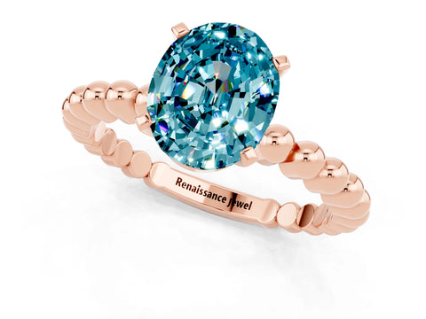 Rose gold Oval Cut Blue Topaz Solitaire Ring with Beaded Band and Prong Setting_1