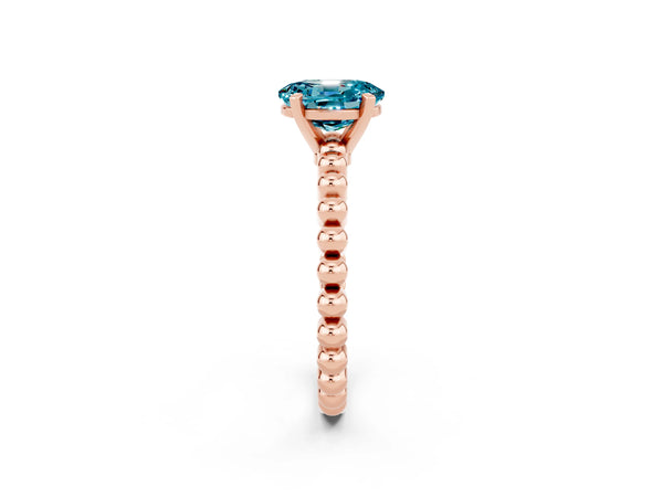 Rose gold Oval Cut Blue Topaz Solitaire Ring with Beaded Band and Prong Setting