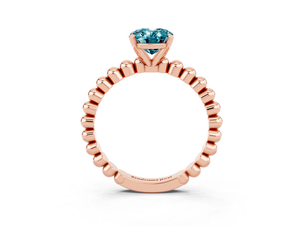 Rose gold Oval Cut Blue Topaz Solitaire Ring with Beaded Band and Prong Setting