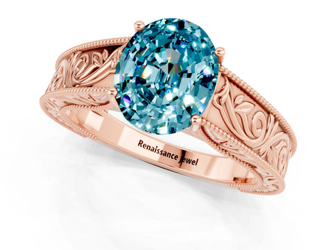 Rose gold Oval Cut Blue Topaz Solitaire Ring with Engraved Band and Four-Prong Setting_1