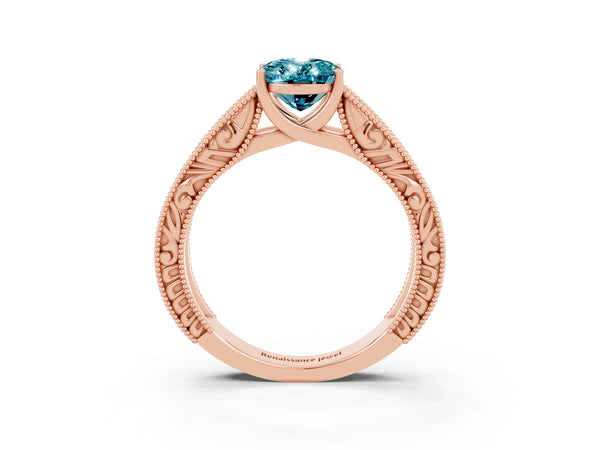 Rose gold Oval Cut Blue Topaz Solitaire Ring with Engraved Band and Four-Prong Setting