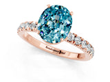 Rose gold Oval Cut Blue Topaz Solitaire Ring with Pavé Accents and Four-Prong Setting_1
