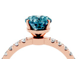 Rose gold Oval Cut Blue Topaz Solitaire Ring with Pavé Accents and Four-Prong Setting_4