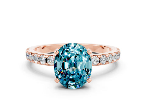 Rose gold Oval Cut Blue Topaz Solitaire Ring with Pavé Band and Four-Prong Setting_36