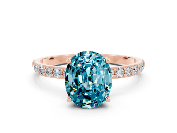 Rose gold Oval Cut Blue Topaz Solitaire Ring with Round  Pavé Band and Prong Setting