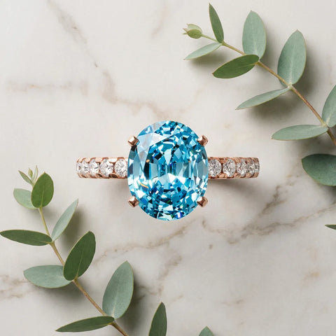 Rose gold Oval Cut Blue Topaz Solitaire Ring with Round  Pavé Band and Four-Prong Setting_57