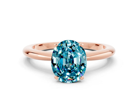 Rose gold Oval Cut Blue Topaz Solitaire Ring with Six-Prong Setting and Classic Band