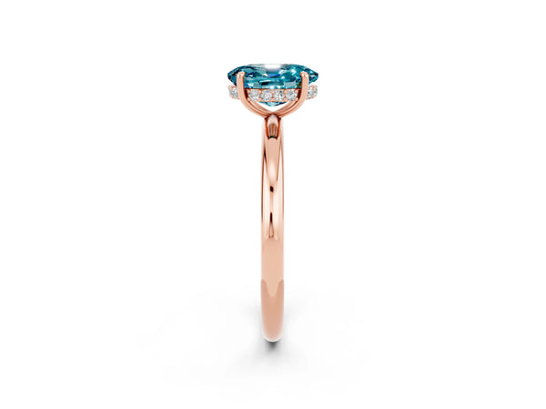 Rose gold Oval Cut Blue Topaz Solitaire Ring with Thin Band and Four-Prong Setting