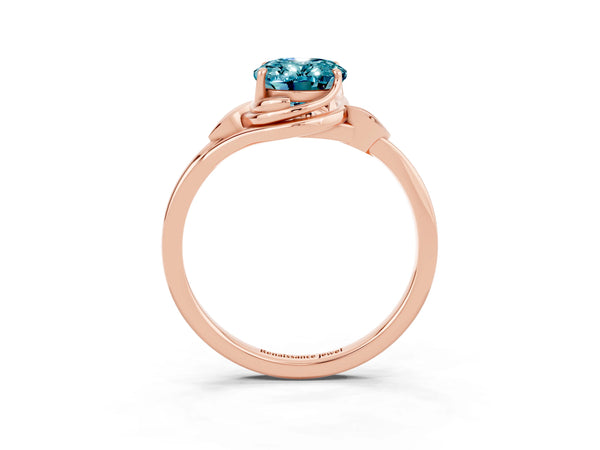 Rose gold Oval Cut Blue Topaz Solitaire Ring with Twist Band and Four-Prong Setting