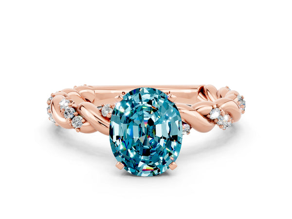 Rose gold Oval Cut Blue Topaz Solitaire Ring with Twisted Band and Pavé Accents