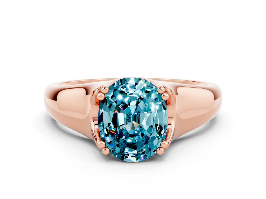 Rose gold Oval Cut Blue Topaz Solitaire Ring with Wide Band and Prong Setting
