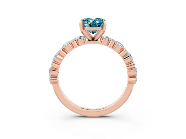 Rose gold Oval Cut Blue Topaz Side Stone Solitaire Ring with Round  and Four-Prong Setting