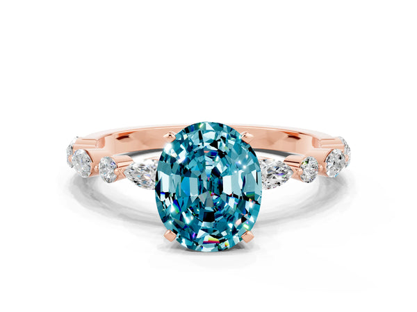 Rose gold Oval Cut Blue Topaz Ring with Marquise and Round  Side Stones and Four-Prong Setting