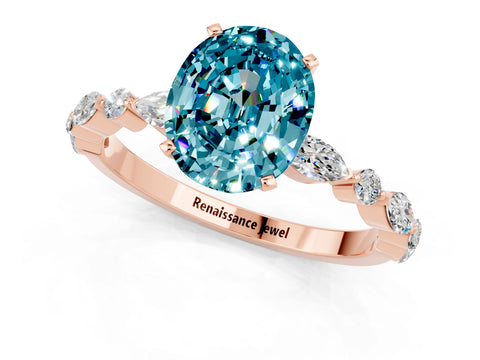 Rose gold Oval Cut Blue Topaz Solitaire with Side Stones on a Pavé Band and Four-Prong Setting_1